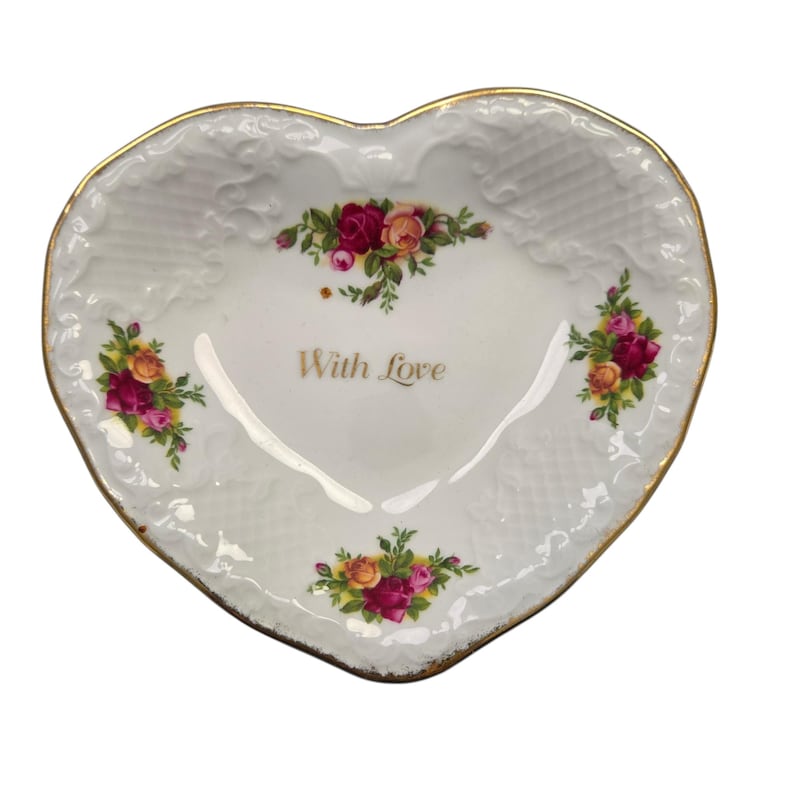 May include: A rustic wooden sign with the text "Welcome to our home" in white lettering. The sign features a distressed finish and a simple, inviting design, perfect for a front porch or entryway.