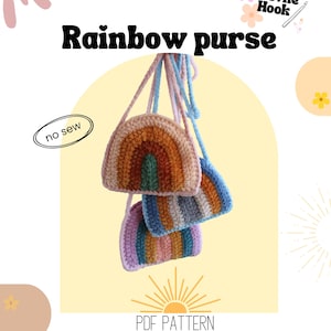 May include: Three crocheted rainbow purses in shades of brown, blue, and purple hang against a yellow backdrop. The purses have a rainbow design and are suspended by blue and pink cords. Text on the image reads "Rainbow purse", "no sew", and "PDF PATTERN".
