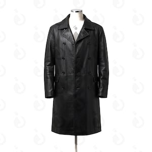 May include: A black leather trench coat with a double-breasted design. The coat features a notched collar, two front pockets, and multiple buttons. The coat is displayed on a mannequin.