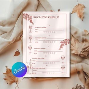 May include: A wine tasting scorecard with a pale pink background and burgundy illustrations. The scorecard includes spaces for notes and rankings, with the text "WINE TASTING SCORECARD" at the top. The Canva logo is visible in the bottom left corner.