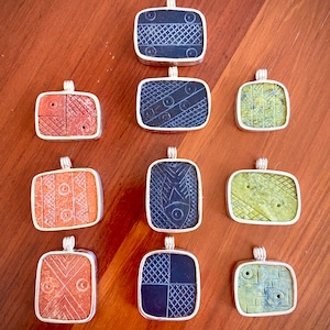 Peruvian handmade stone pendant encased in sterling silver