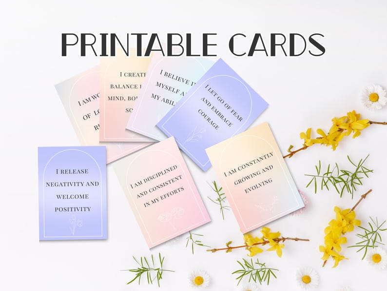 May include: Printable cards with affirmations in a variety of pastel colors. The cards feature phrases like "I release negativity and welcome positivity" and "I am constantly growing and evolving." The words "Printable Cards" are at the top.