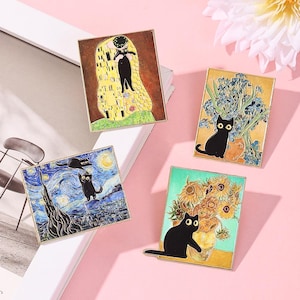 May include: Four enamel pins featuring famous art pieces with a cat theme. The pins depict "The Kiss", "Starry Night", sunflowers, and irises. Each pin has a gold border and a black cat.