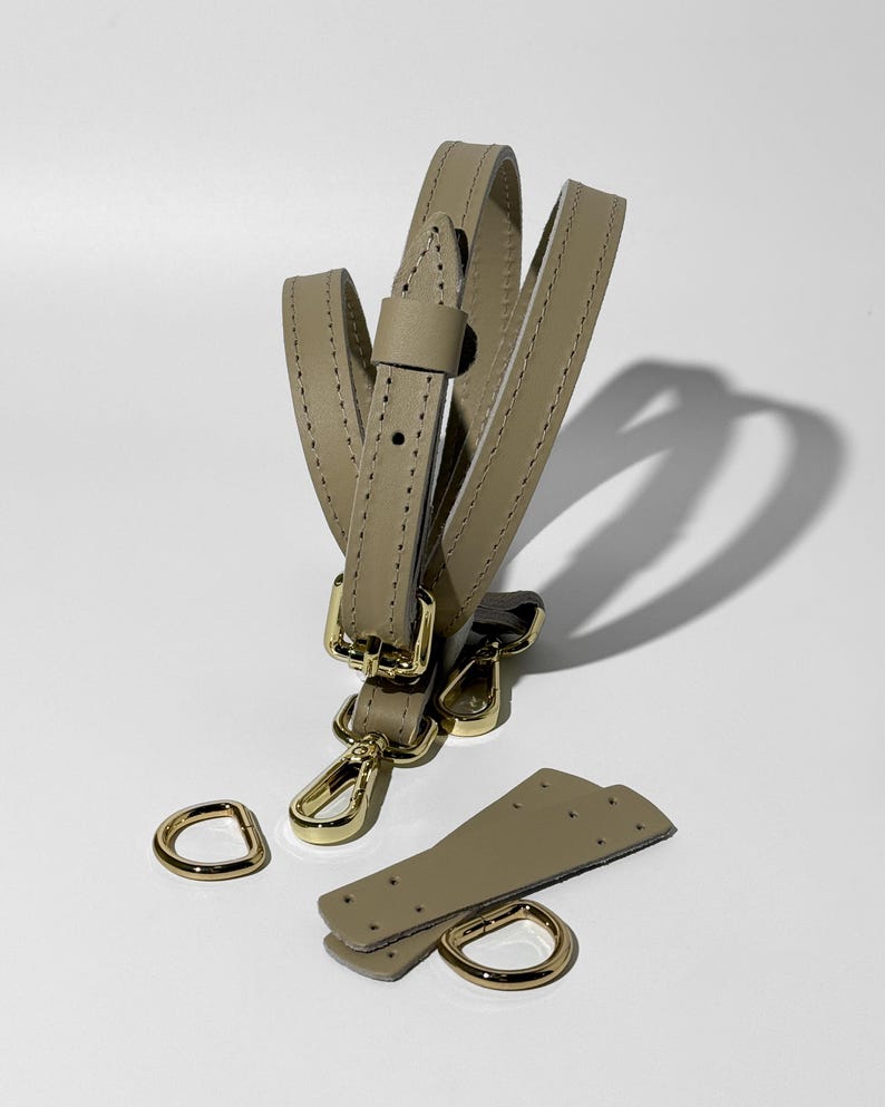 leather strap with metal clips, swivel hook leather strap, fashionable leather bag strap, handmade purse strap leather, leather strap for tote bag, leather strap for purse making, modern leather handbag strap