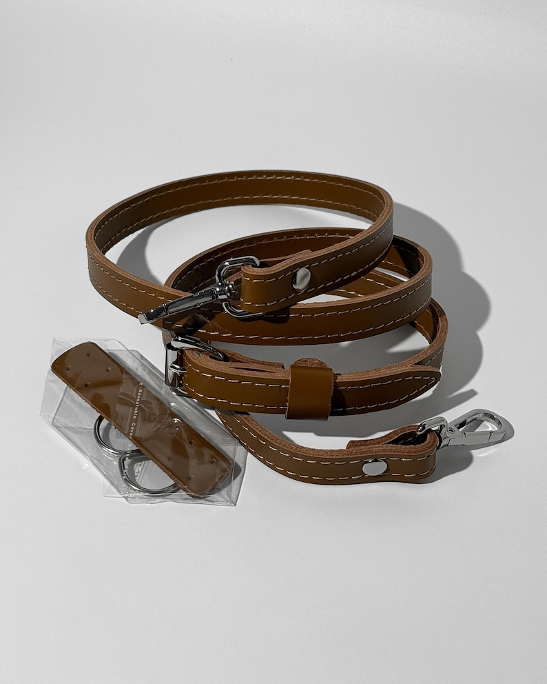 leather strap for women bag, classic leather shoulder strap, everyday leather bag strap, polished leather replacement strap, leather strap for custom purse, refined leather handbag accessory, slim purse strap adjustable