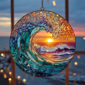 May include: Circular stained glass art piece depicting a wave with a sunset scene. The wave is made of blue and teal glass, with a golden, sparkling crest. The sunset features orange, yellow, and purple hues, creating a vibrant ocean scene.