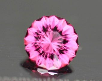 0.92cts nature unheat pink round garnet - precision cut