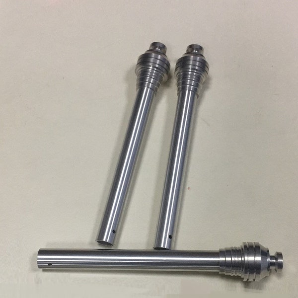May include: Three silver metal rods with a threaded, telescoping design. The rods are approximately 12 inches long and have a diameter of about 1/2 inch.