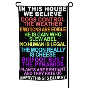 In This House We Believe Garden Flag
