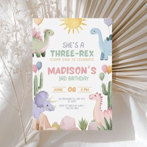 May include: A whimsical birthday invitation with a dinosaur theme. The design features a sun, balloons, and various dinosaurs in pastel colors. Text reads "She's a Three-Rex, Madison's 3rd Birthday, June 06, 2 PM."