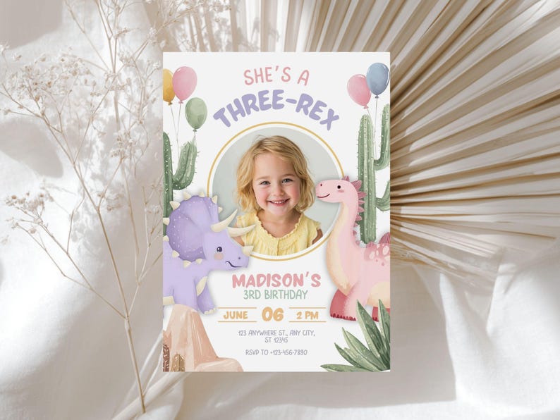 May include: A birthday invitation with a child's photo, featuring a dinosaur theme. The text reads "She's a Three-Rex" with a child's name and birthday details. Includes illustrations of dinosaurs, cacti, and balloons.