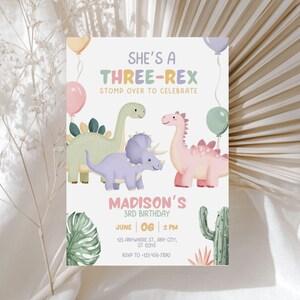 May include: A birthday invitation with the text "SHE'S A THREE-REX" and "STOMP OVER TO CELEBRATE". The invitation features illustrations of three dinosaurs, balloons, and cacti. The invitation is for Madison's 3rd birthday.