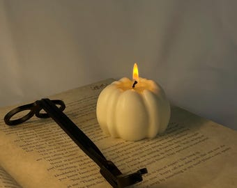 Unscented pumpkin shaped candle
