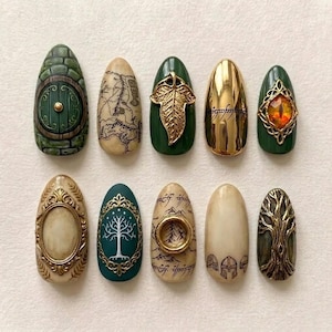 May include: A set of ten almond-shaped press-on nails featuring intricate designs inspired by fantasy literature, including a green round door, a map, a gold leaf, a metallic ring with script, an orange eye, a gold frame, a white tree, and a tree.