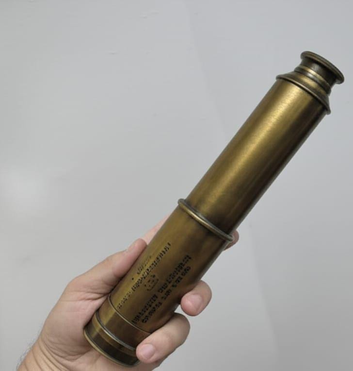A four draw telescope by Kelvin & Hughes, London dated 1917