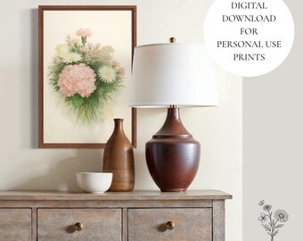 May include: A framed watercolor print of pink and white flowers hangs above a wooden console table. A brown ceramic lamp with a white shade and a decorative vase are on the table. The text "DIGITAL DOWNLOAD FOR PERSONAL USE PRINTS" is in a white circle.