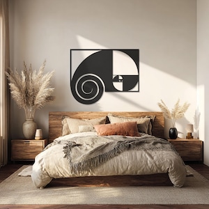 May include: A black metal wall art piece depicting the Fibonacci sequence is mounted above a bed with a wooden headboard. The bedroom features neutral tones, with beige bedding and a brown rug. Decorative vases with dried plants are on the bedside tables.