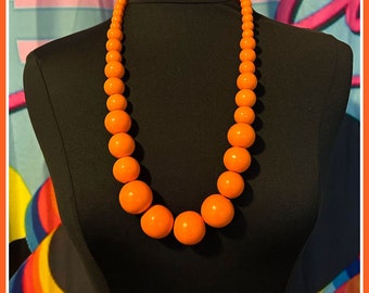 80s style orange beaded necklace 80s costume accessories 80s jewelry 80s kid 80s party 80s vibes 80s accessories 80s jewelry 80s day 80s cr