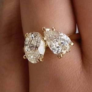 Toi et Moi Moissanit Verlobungsring: Oval & Tropfenschliff, Gold