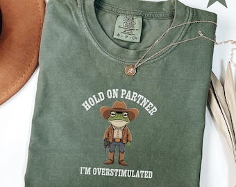 Hold On Partner Im Overstimulated Shirt Cowboy Frog Shirt Unhinged Tshirt Weirdcore Clothing Gen Z Shirt Weird Stuff Funny Funny Meme Tshirt