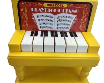 Piano musical vintage Shelcore Play Right para niños, 1984.