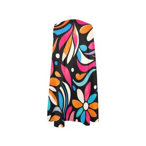 Minivestido floral holgado con bolsillos, sin mangas, estilo retro, ideal para vacaciones de verano. imagen 11