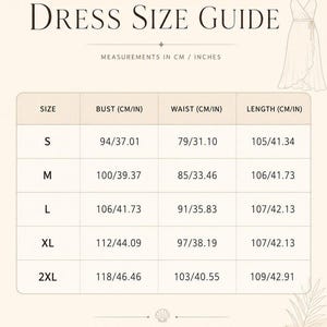 May include: A dress size guide chart featuring a table with columns for size, bust, waist, and length in cm and inches. Sizes range from S to 2XL with specific measurements provided. Includes a line drawing of a wrap dress and text.