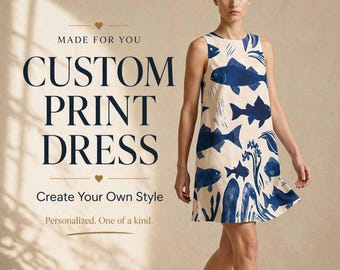 May include: A sleeveless, knee-length dress with a cream background and a blue fish print. The dress features the text "CUSTOM PRINT DRESS" and "Create Your Own Style". The model is wearing the dress.