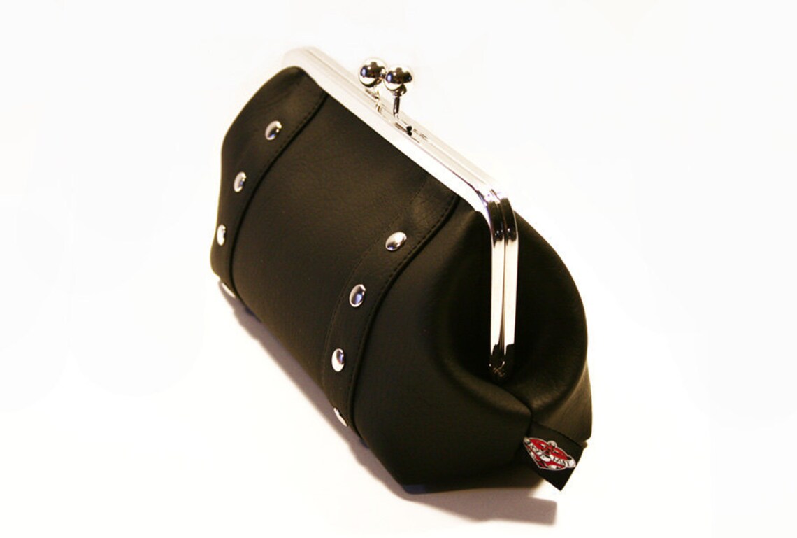 black faux leather clutch bag