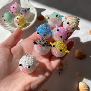 Ciondoli/pendenti a forma di pesce palla con perline