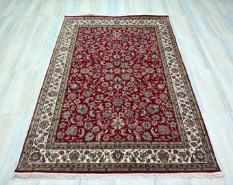 Alfombra Kashan de lana anudada a mano: Alfombra tradicional persa con estampado floral, 168 x 234 cm.