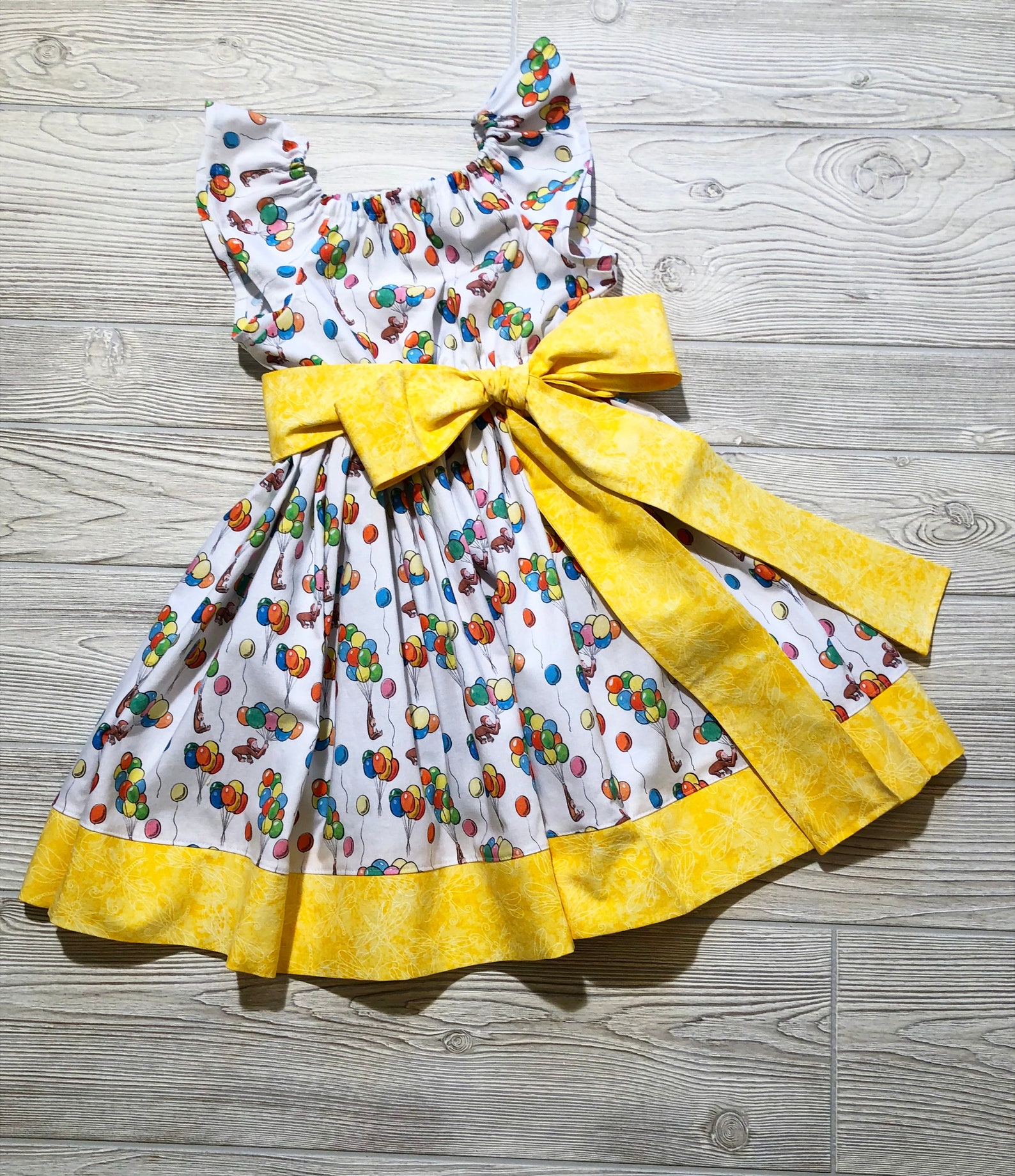 Peasant Style Dress made with Curious George Fabric