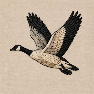May include: An embroidered patch of a Canada goose in flight, featuring a black head and neck with a white cheek patch, and wings detailed with black and tan thread. The goose is depicted in a dynamic flying pose against a neutral beige fabric.