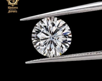 May include: A round, brilliant-cut diamond held by silver tweezers against a black background. The diamond sparkles with numerous facets, reflecting light. The image includes the logo of Kreeshva Jewelry Exports.