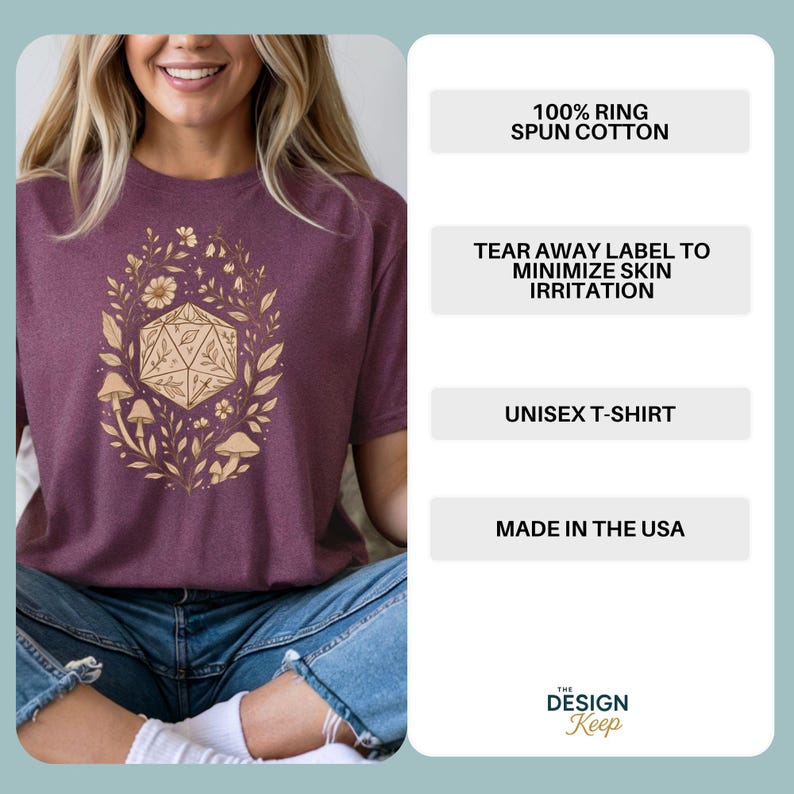 May include: A maroon unisex t-shirt featuring a gold floral and geometric design. The shirt has short sleeves and is made of 100% ring-spun cotton. The text on the shirt reads "Unisex T-Shirt" and "Made in the USA".
