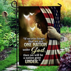May include: A rectangular garden flag featuring a profile illustration of Jesus with a crown of thorns, partially covered by a draped American flag. The text reads: If we ever forget that we are ONE NATION under God, then we will be a nation gone UNDER.