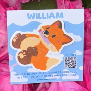 May include: A sticker featuring a cartoon fox named William, lying down with a purple collar. The sticker is on a blue background with the text "WILLIAM" at the top. The text "WILLIAM KEEPS LITTLE TREASURES HIDDEN JUST IN CASE SOMEONE COMES BACK FOR THEM" is also included.