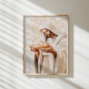 May include: A framed artwork depicts a figure in white robes holding bread. The figure has a beard and is looking down. The background features a light-colored mosaic design. The text "WORSHIP HAUS" is at the bottom.