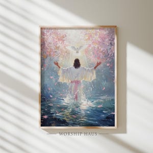 May include: A framed print depicting a figure in white robes standing in water with arms outstretched. A white dove hovers above, with pink and white blossoms in the background. The text "WORSHIP HAUS" is at the bottom.