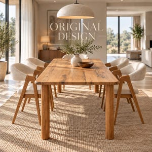 May include: A rectangular wooden dining table with four legs and six chairs featuring light-colored upholstered seats and wooden frames. A white ceramic vase with greenery and a small wooden bowl sit on the table surface. Text reads ORIGINAL DESIGN.
