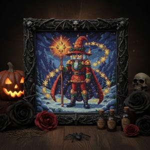 May include: A framed cross-stitch artwork depicting a wizard nutcracker holding a star-topped staff. The black frame has skull and bat motifs. The scene includes a carved pumpkin, roses, and potion bottles, creating a Halloween theme.