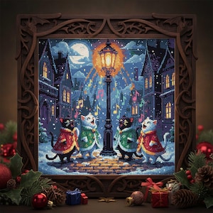 May include: Cross-stitch art of four cats singing carols in a snowy town square, under a glowing street lamp. The cats wear red and green capes. The scene is framed in a dark wooden border, with Christmas decorations in the foreground.