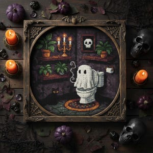 May include: A framed cross-stitch showing a ghost on a toilet in a spooky bathroom. The artwork includes a black cat, candles, skulls, and pumpkins, arranged on a wooden surface, creating a Halloween theme.
