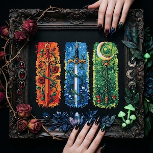 May include: Cross-stitch art featuring three vertical panels with swords, each in a different color scheme: red and orange, blue, and green. The panels are framed in a dark, ornate frame with floral and botanical accents. The artwork is displayed on a black background.