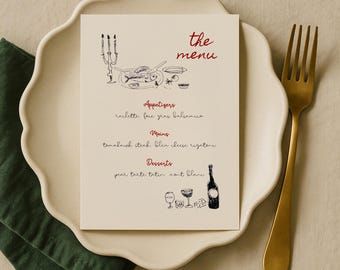 May include: A menu card with the words "the menu" in red script. The menu features appetizers, mains, and desserts, with illustrations of food and wine glasses. The card rests on a white scalloped plate with a gold fork.