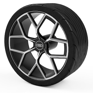 May include: A black car wheel with a tire and a silver and black rim. The rim has a geometric design with the Audi logo in the center. The tire has a textured surface.