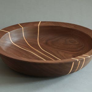 Black Walnut bowl with Maple lines