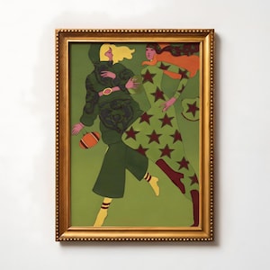 May include: A framed art print featuring two figures in green outfits. One figure is wearing a star-patterned dress with burgundy boots, while the other is in a green hooded outfit. The artwork has a gold frame and a green background.