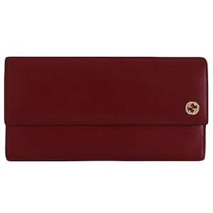 May include: A burgundy leather wallet with a flap closure. The wallet features a gold-colored logo on the front. The wallet is rectangular and appears to be made of a textured leather material.