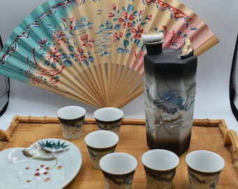 Minamoto sake dragonware decanter whistling bird and cups and ensemble hand painted fan bamboo tray hand painted dish from Japan